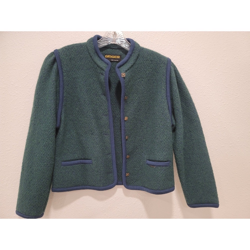geiger wool cardigan made in Austria size 42, dark green blue trim.